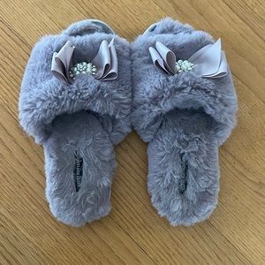 fuzzy light purple slippers